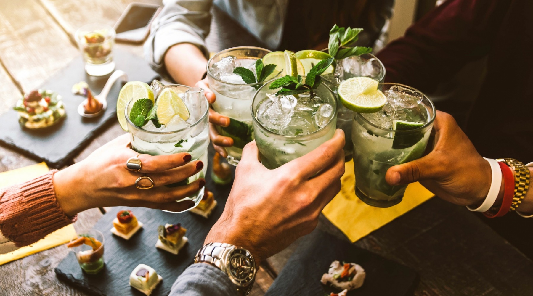 The essence of exceptional living a group of people with drinks